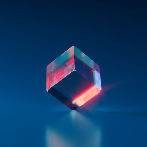 An image of a glass cube standing on a corner.